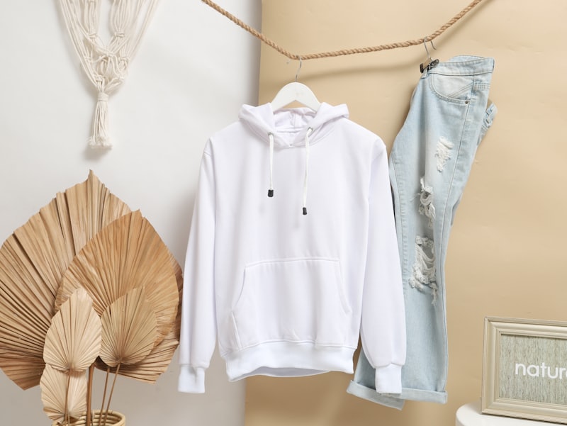 A plain hoodie on a hanger
