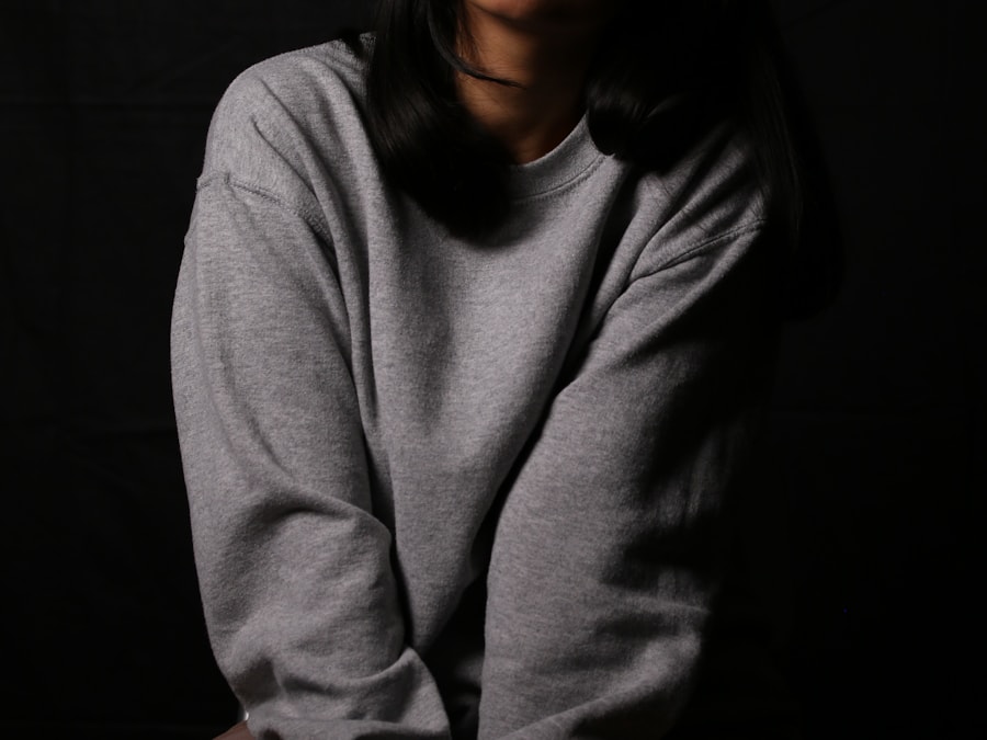 A grey crew-neck knit