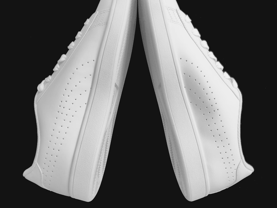 A pair of clean white leather sneakers
