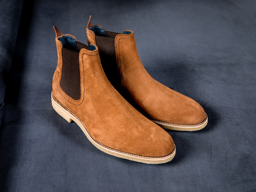A pair of tan suede chelsea boots
