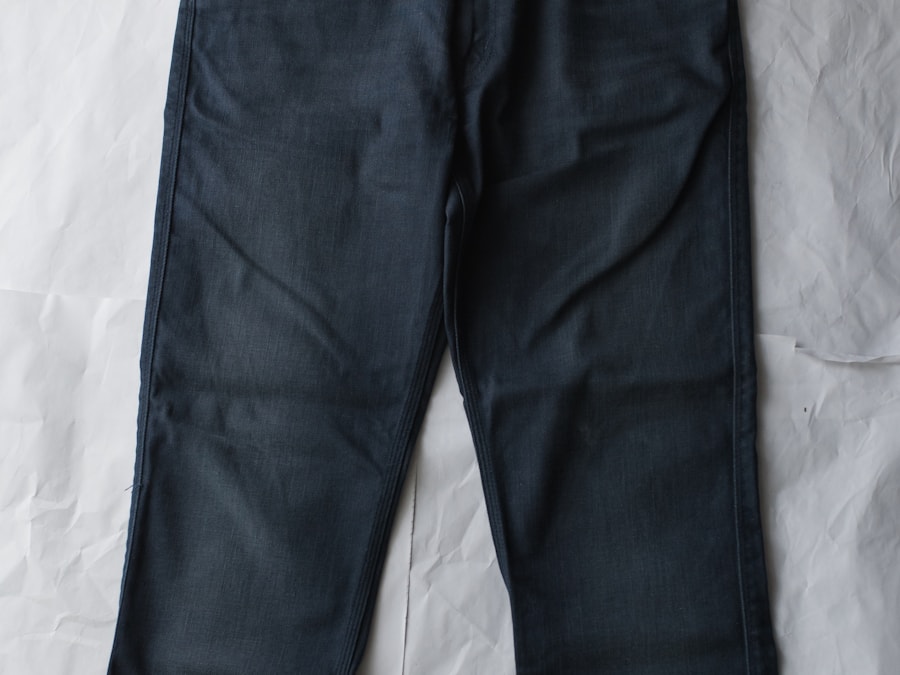 A pair of dark indigo jeans