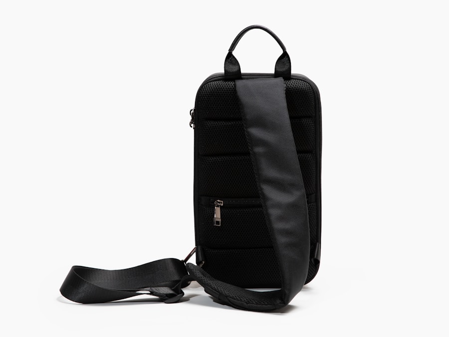 A black technical sling bag