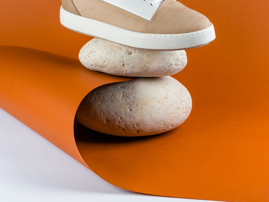 A pair of tan suede retro court trainers